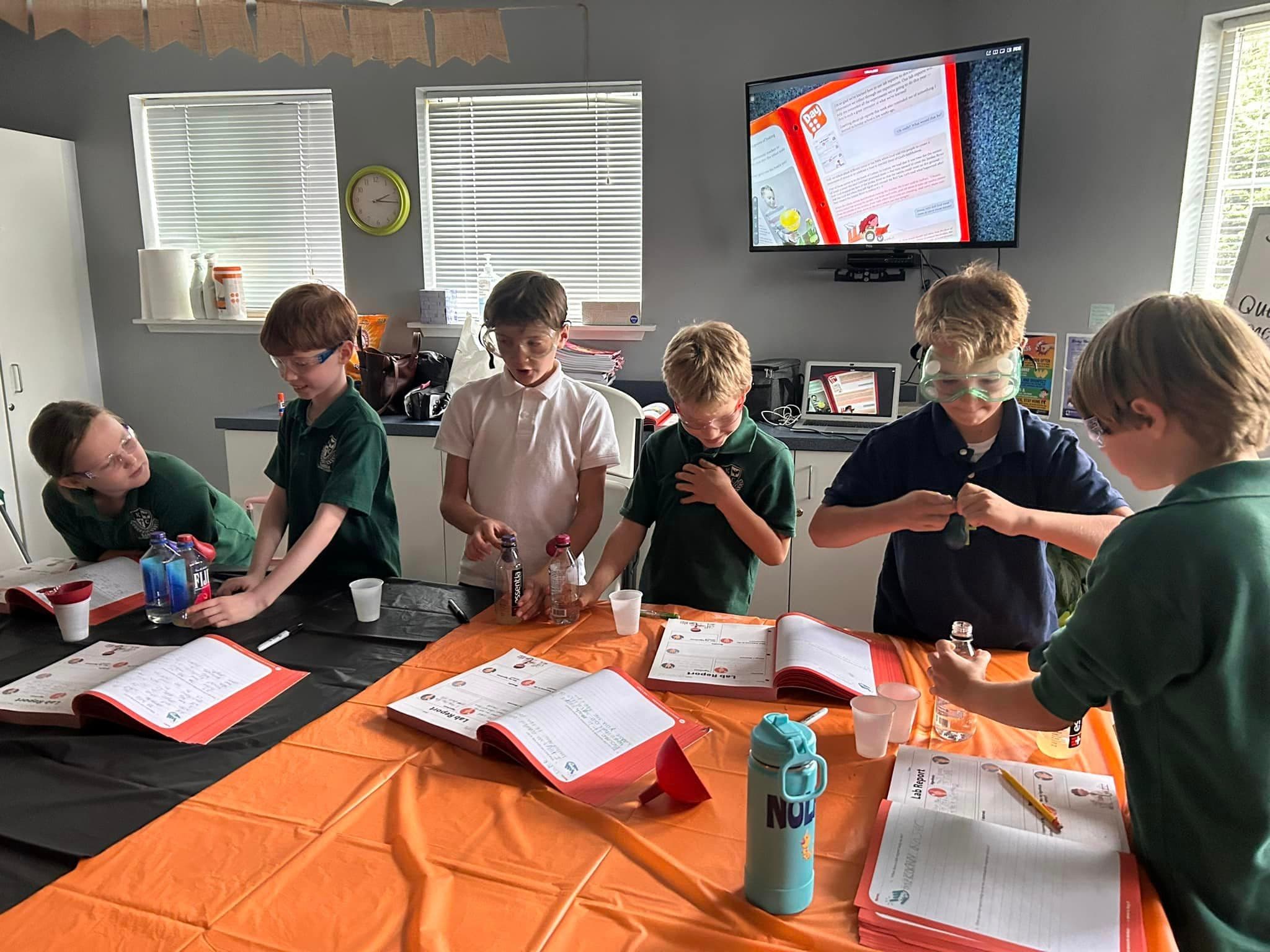 Kardia students doing a science experiment